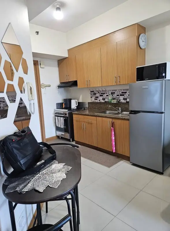 1-bedroom condo for rent in The Trion Towers, photo 2
